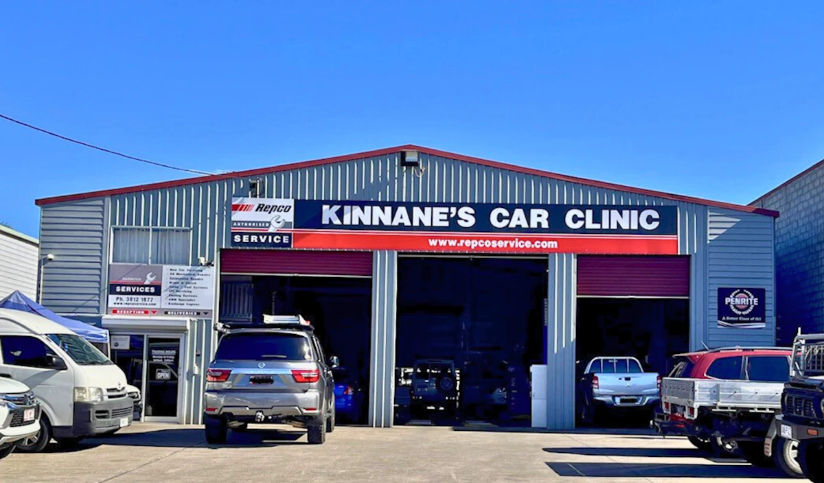 The busy exterior of Kinanne's Car Clinic workshop